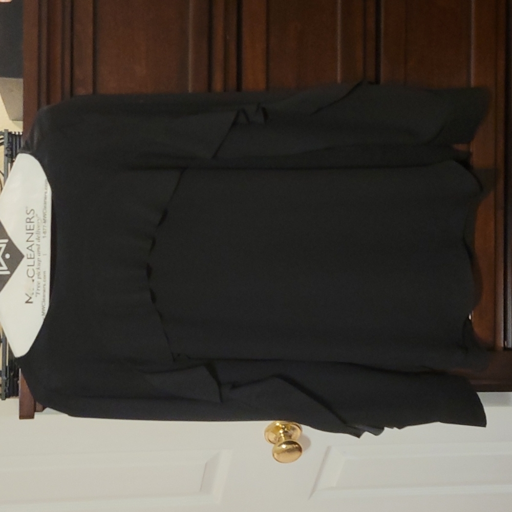 Black ruffled blouse